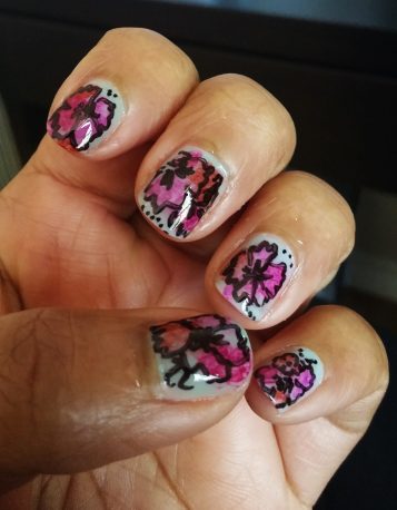 Multicoloured floral Sharpie manicure